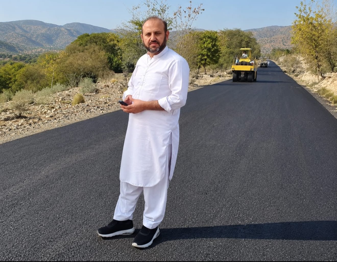 Road construction project handover, ZHA Construction